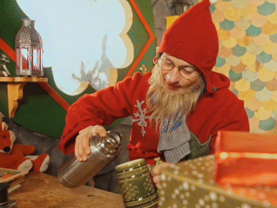 Elf Santa Pouring Wine On Glass GIF