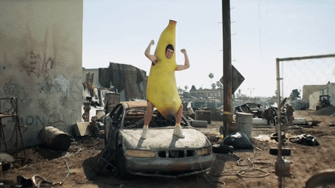 Eli Manning Wearing Spinning Banana Costume GIF