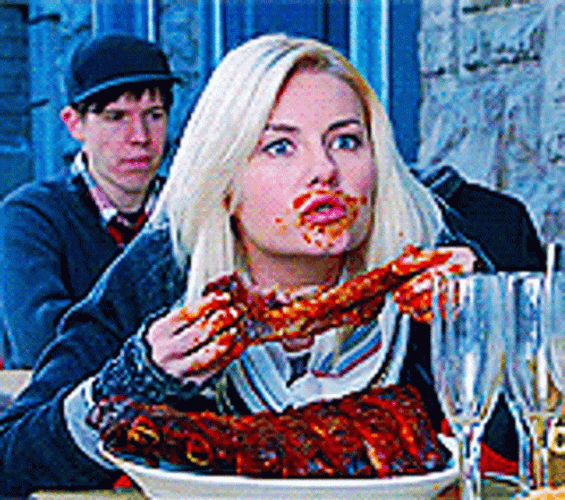 Elisha Cuthbert Munching On Ribs Bbq GIF