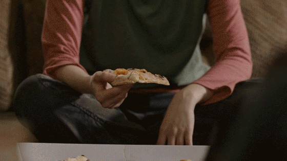 Elizabeth Hurley Eating Pizza GIF