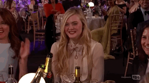 Elle Fanning Flattered Headshake Sag Awards GIF