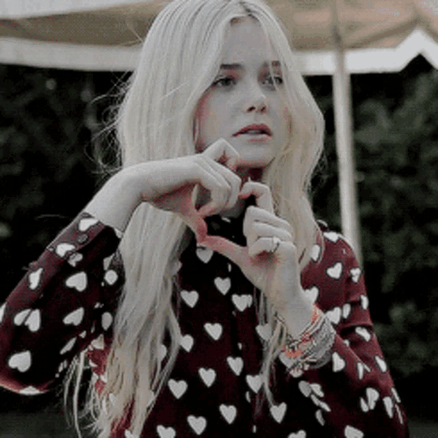 Elle Fanning Heartbreak Hand Sign Laugh GIF