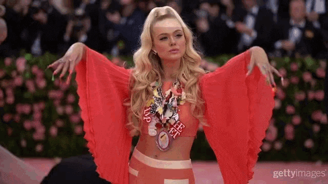 Elle Fanning Kiss Pose Fashion Gala GIF