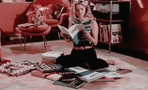 Elle Woods Searching Through Magazine GIF