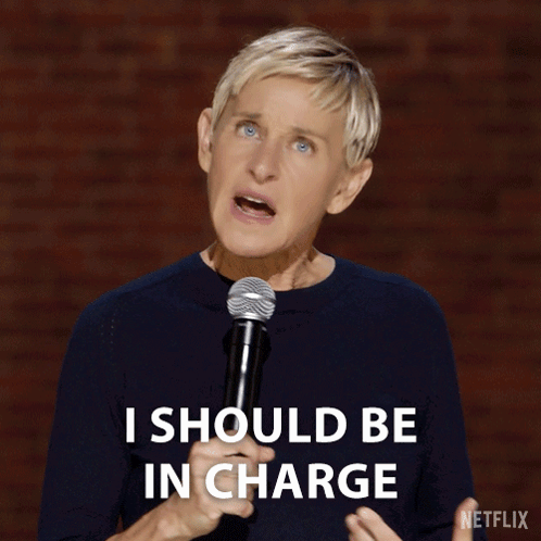 Ellen Degeneres Says I Should Be In Charge While Holding A Microphone GIF