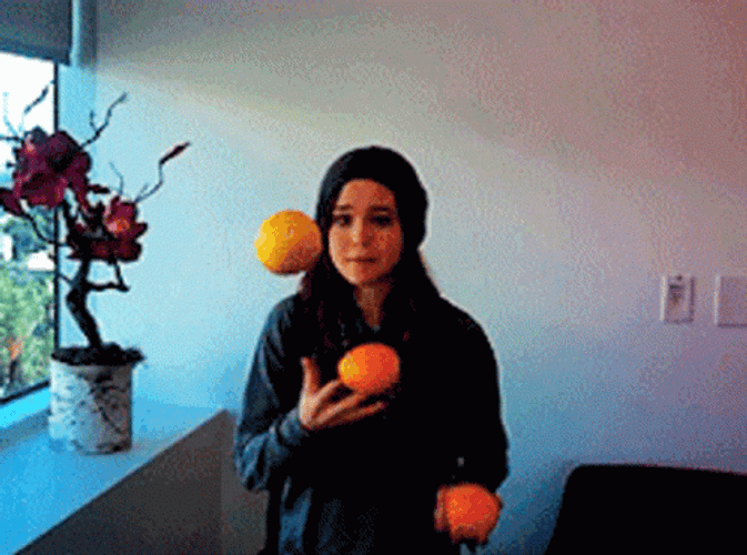 Elliot Page Juggling Oranges GIF