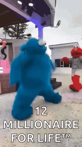 Elmo and Cookie Monster Dancing in Front of 12 Millionaire for Life Sign