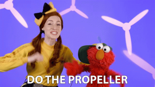 Elmo Dancing And Emma Watkins Do The Propeller GIF