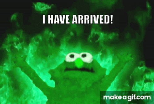 Elmo From Sesame Street Is Glowing In The Dark And Saying I Have Arrived . GIF
