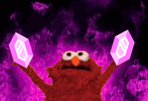 Elmo From Sesame Street Is Holding Two Pink Blocks In His Hands GIF