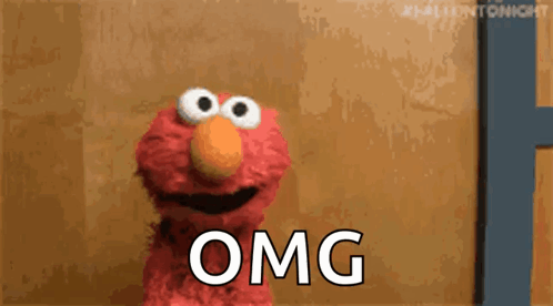 Elmo From Sesame Street Is Making A Funny Face And Says Omg . GIF