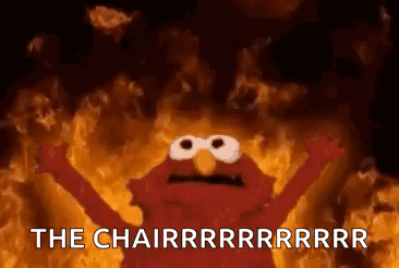 Elmo From Sesame Street Is On Fire With His Arms Outstretched And The Words `` The Chairrrrrrrr '' . GIF