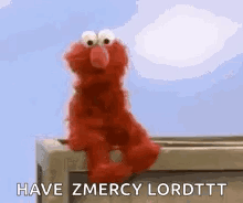 Elmo From Sesame Street Is Sitting On A Railing And Asking For Mercy . GIF