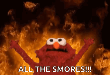 Elmo From Sesame Street Is Standing In Front Of A Fire And Says `` All The Smores !! '' GIF