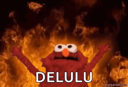 Elmo From Sesame Street Is Standing In Front Of A Fire And Says `` Delulu '' . GIF