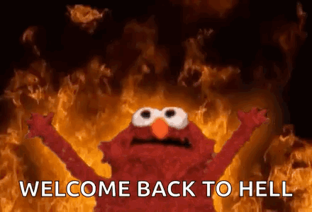 elmo from sesame street is standing in front of a fire and says welcome back to hell .