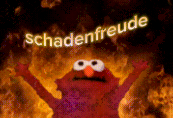 Elmo From Sesame Street Is Standing In Front Of A Fire With The Words Schadenfreude Above Him GIF