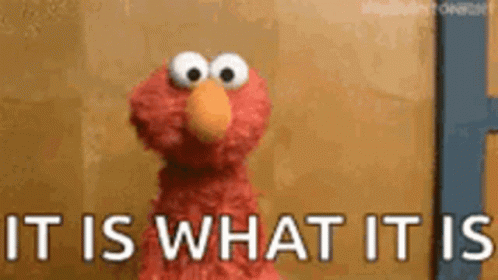 Elmo From Sesame Street Is Standing In Front Of A Wall And Says `` It Is What It Is '' . GIF