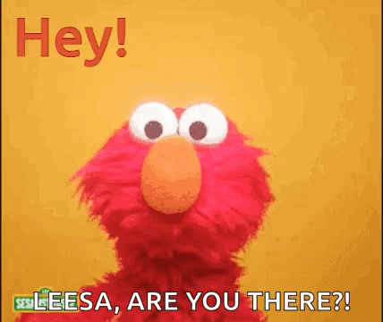 elmo from sesame street is standing in front of a yellow background .