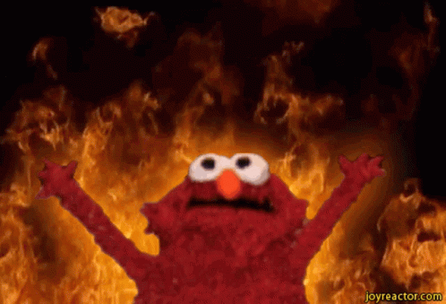 Elmo From Sesame Street Is Surrounded By Fire GIF
