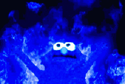 Elmo From Sesame Street Is Surrounded By Flames GIF