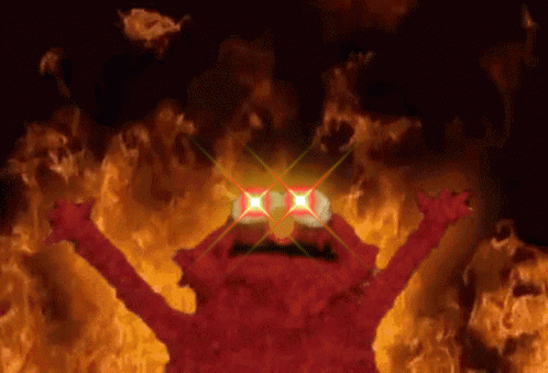 Elmo From Sesame Street on Fire With Glowing Eyes