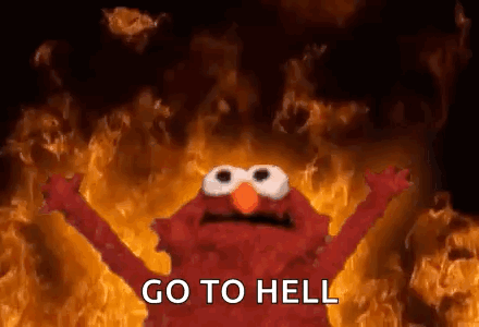 Elmo From Sesame Street Standing in Front of Fire