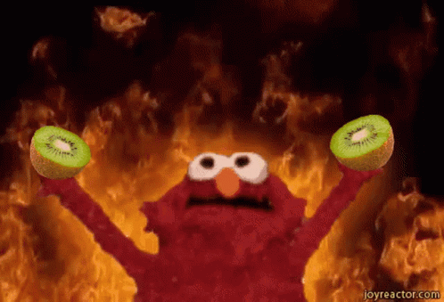 Elmo Holding Two Kiwi Fruits By Fire GIF