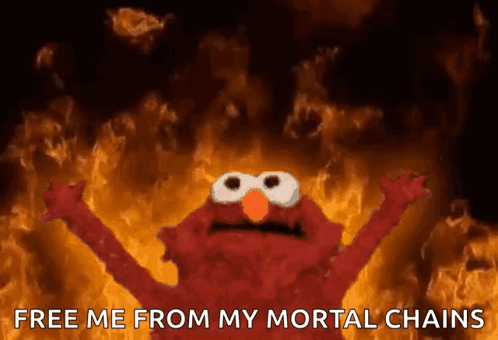 Elmo In Fire Saying Free Me From My Mortal Chains GIF