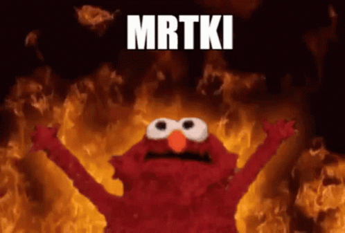 Elmo Is In The Middle Of A Fire With The Word Mrtki Written Above Him GIF