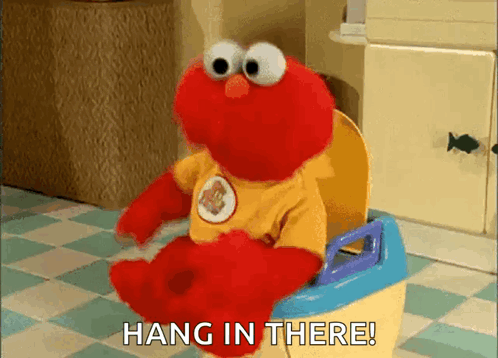 Elmo Is Sitting On A Potty With The Words Hang In There GIF
