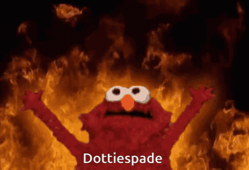 Elmo Is Standing In Front Of A Fire And Says ' Dottiespade ' At The Bottom GIF