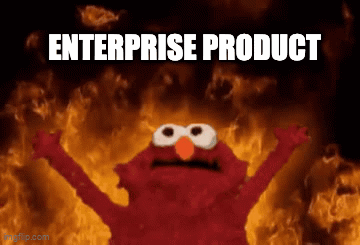 Elmo Is Standing In Front Of A Fire With The Words Enterprise Product Written Below Him GIF