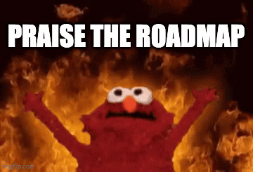 Elmo Is Standing In Front Of A Fire With The Words Praise The Roadmap Written Below Him GIF