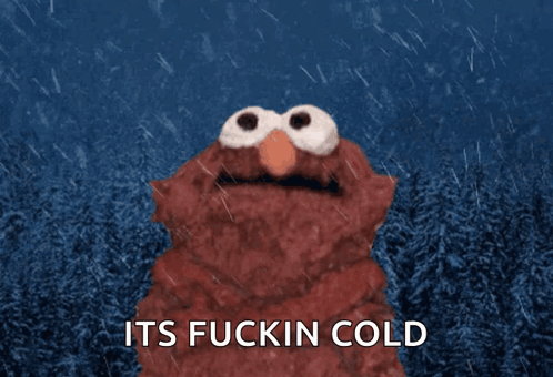 Elmo Is Standing In The Rain With The Words Its Fuckin Cold Above Him GIF