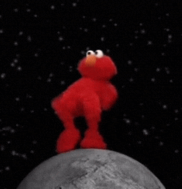 Elmo Is Standing On The Moon Holding A Planet In His Hands GIF