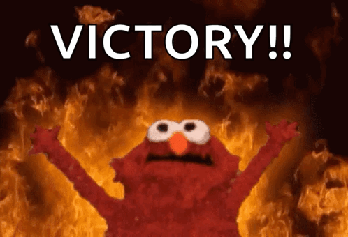 Elmo Is Surrounded By Flames And The Word Victory Is Written Above Him GIF