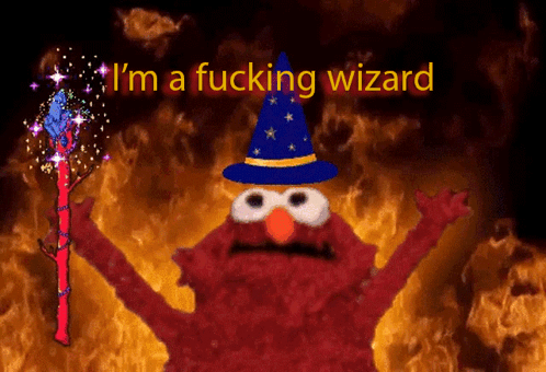 Elmo Is Wearing A Wizard Hat And Holding A Wand With The Words I 'M A Fucking Wizard Behind Him GIF
