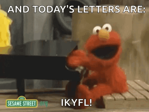 Elmo on Bench Says Today's Letters Are IKYFL