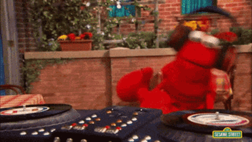 Elmo Playing Roulette on Record Player