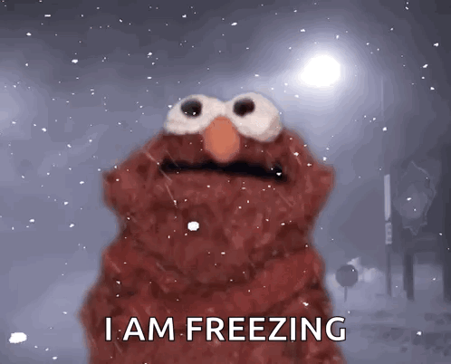 Elmo Says I Am Freezing While Standing In The Snow GIF