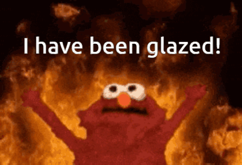 Elmo Says I Have Been Glazed In Front Of Fire GIF