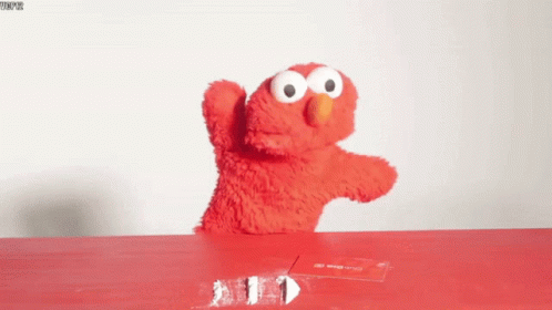 Elmo Sitting Next to Cocaine