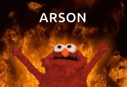 Elmo Standing in Front of Fire with Arson