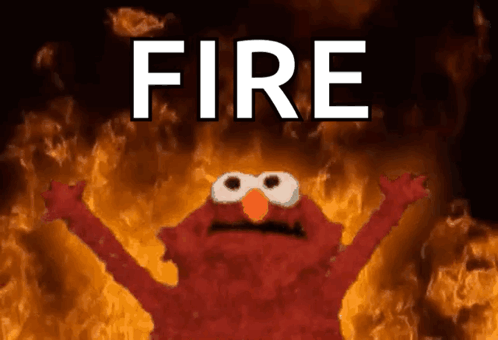 Elmo Surrounded By Flames Saying Fire GIF
