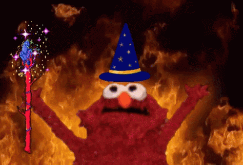 Elmo Wearing Wizard Hat and Holding Wand