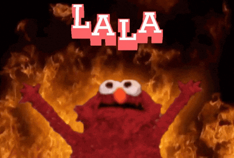 Elmo With Flames Behind Him Saying Lala GIF