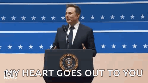 Elon Musk Is Giving A Speech At A Podium In Front Of A Microphone . GIF