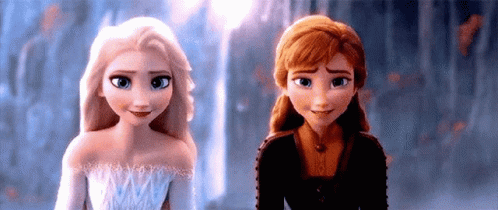 Elsa And Anna From Frozen Are Standing Next To Each Other And Smiling At Each Other . GIF