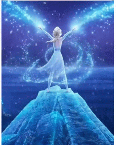 Elsa From The Movie Frozen Is Standing On Top Of A Mountain Of Ice . GIF